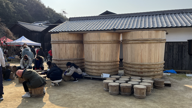 Kioke outside of the Yamaroku soy sauce brewery in Shodoshima. With smaller Taru barrels in the front.