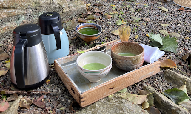 Making tea on the go at a local temple next to a tea field